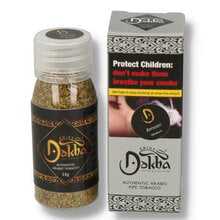 A bottle of green chopped Dokha tobacco next to the branded box