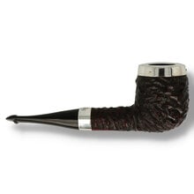 Side view of long Peterson house pipe showing silver band and extended vulcanite stem