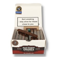 A full box of 50 cigarillos with one rested on top
