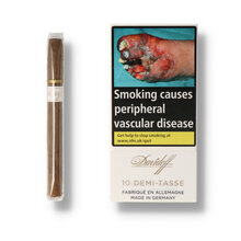 A single pack of 10 Davidoff Demi Tasse with a single cigar laid next to it