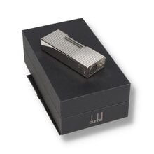 A palladium dunhill lighter with lines design