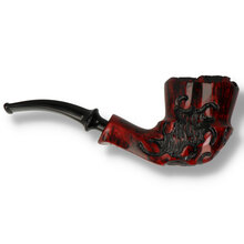 Handmade Danish freehand pipe featuring dramatic crimson stain, carved fantasy details and plateau rim