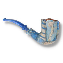 Erik Nording Harmony 714 artistic briar pipe decorated with maritime imagery including a lighthouse and seaside motifs.