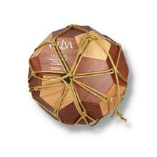 Football shaped humidor in a yellow string net bag