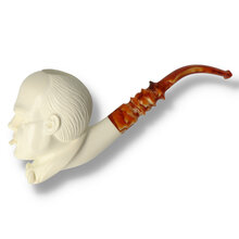 Left side profile of the Levent Winston Churchill meerschaum pipe highlighting the detailed hair carving and amber acrylic stem.