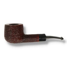 A Bulky pot shaped bowl with a delicately curved saddle stem 