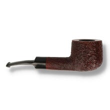 A Bulky pot shaped bowl with a delicately curved saddle stem and rusticated finish