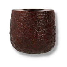 close up of the front of the bowl showing deep rustication